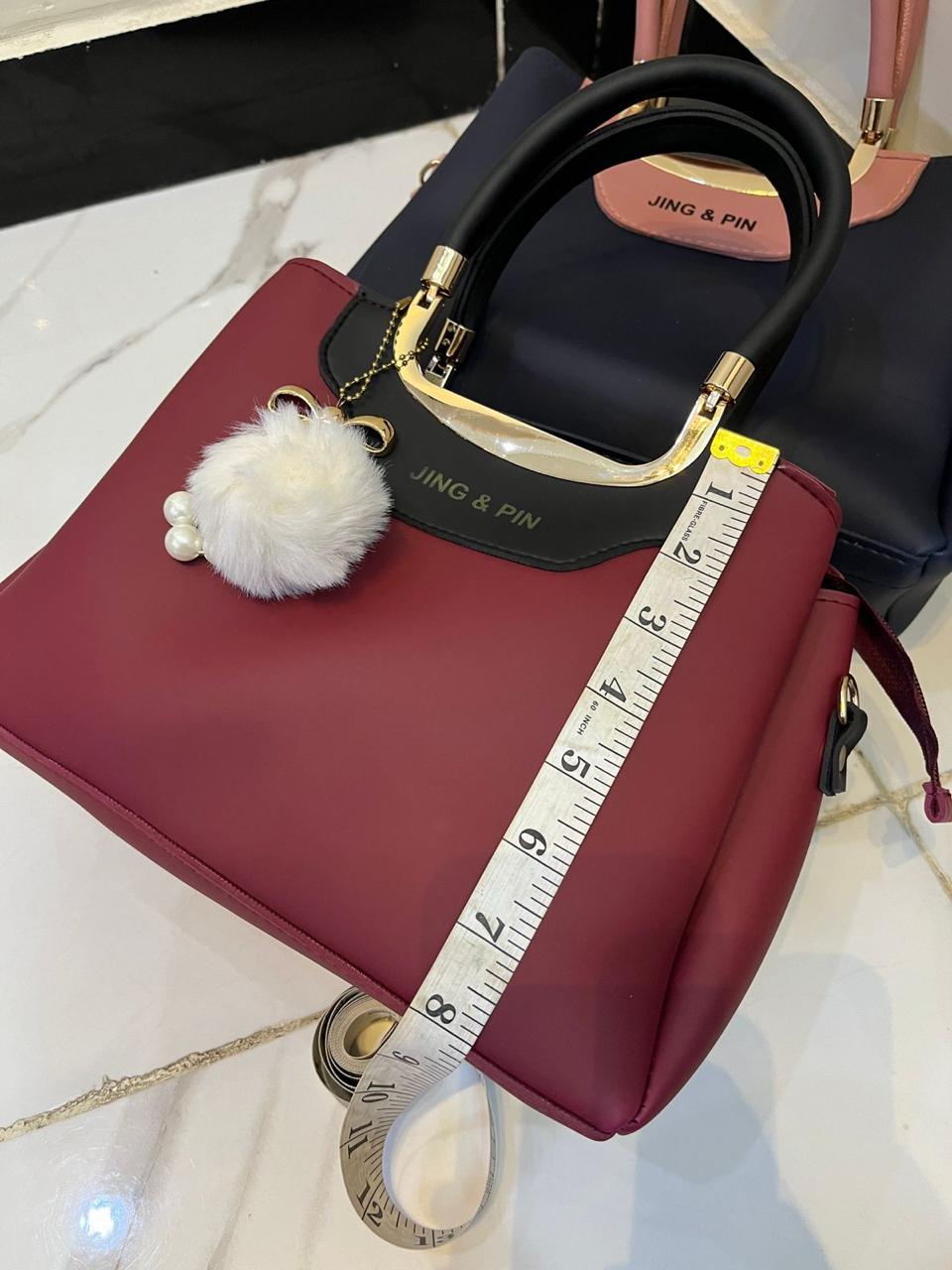 Aesthetic 'JING & PIN' Ladies Handbag Collection with Clutch and Shoulder Strap Option.